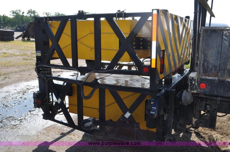 image for item F2498 2003 Sterling LT9500 flatbed truck