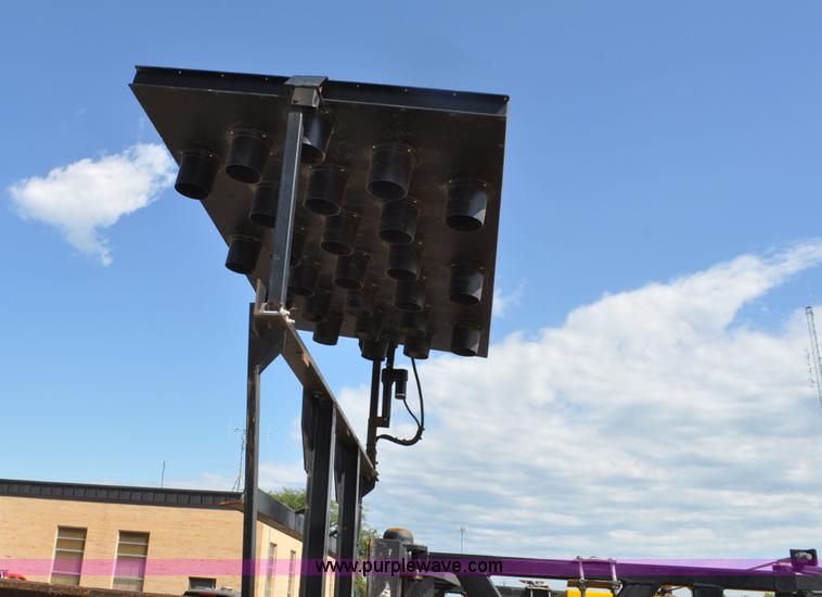 image for item F2498 2003 Sterling LT9500 flatbed truck