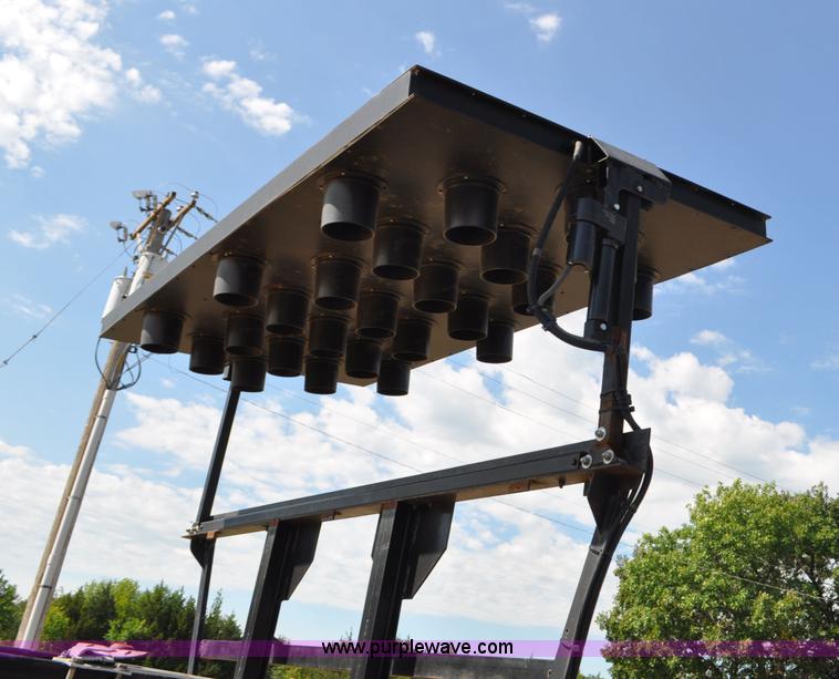 image for item F2498 2003 Sterling LT9500 flatbed truck