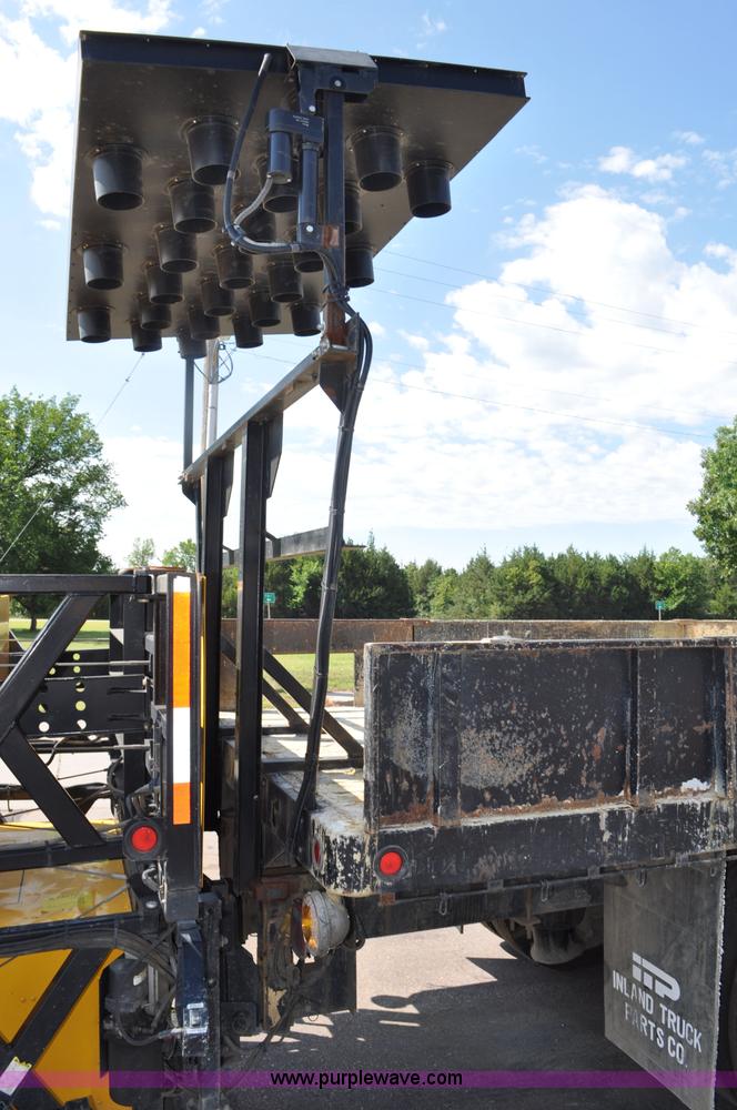 image for item F2498 2003 Sterling LT9500 flatbed truck