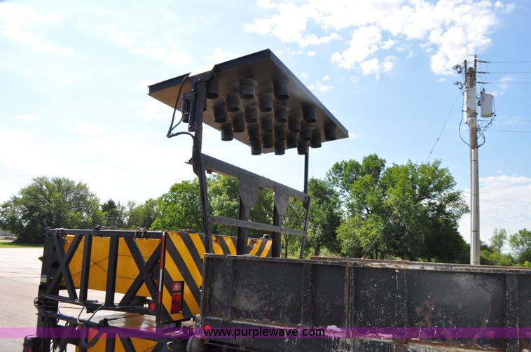 image for item F2498 2003 Sterling LT9500 flatbed truck