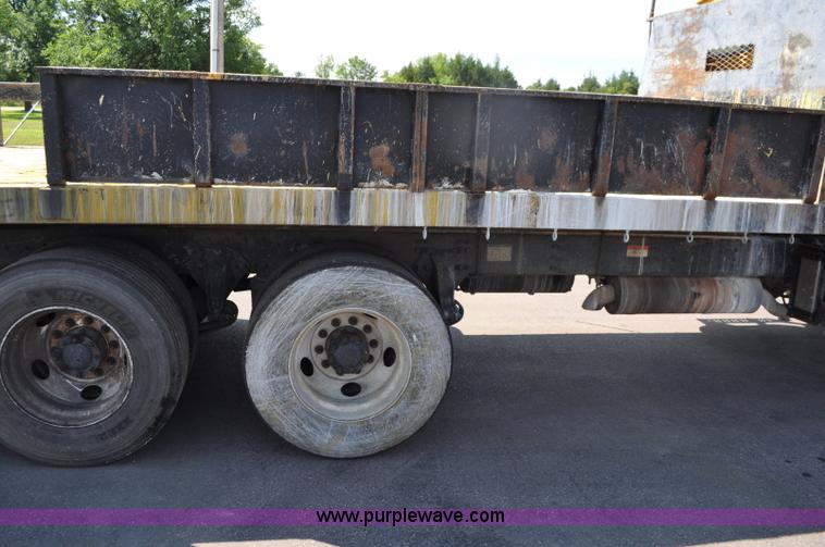 image for item F2498 2003 Sterling LT9500 flatbed truck