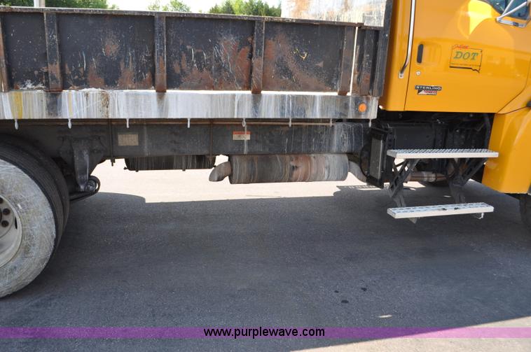 image for item F2498 2003 Sterling LT9500 flatbed truck