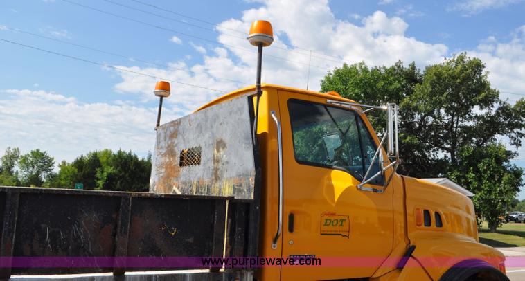 image for item F2498 2003 Sterling LT9500 flatbed truck