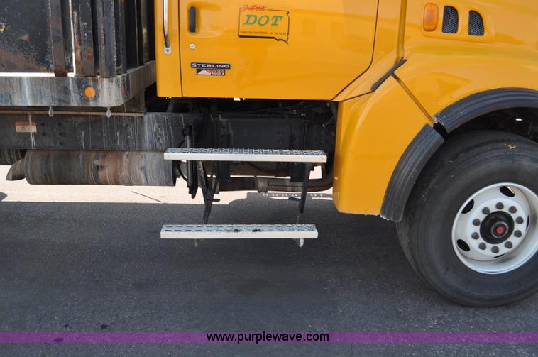 image for item F2498 2003 Sterling LT9500 flatbed truck