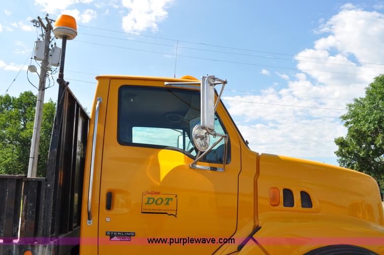 image for item F2498 2003 Sterling LT9500 flatbed truck