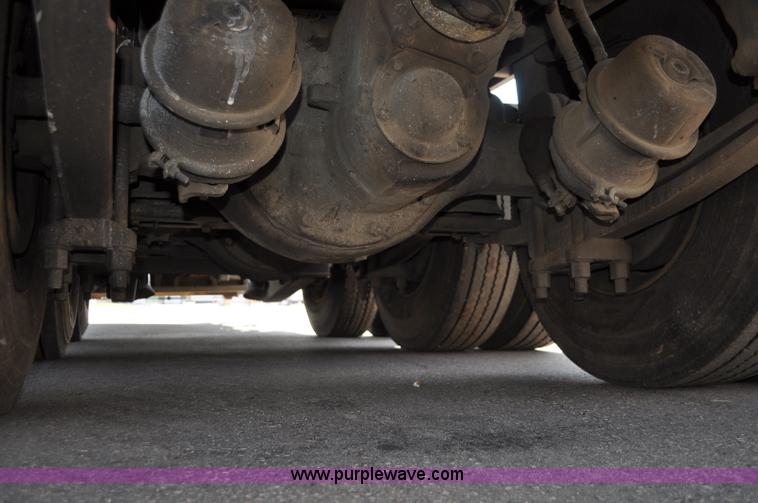 image for item F2498 2003 Sterling LT9500 flatbed truck