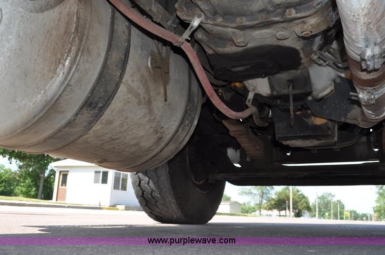 image for item F2498 2003 Sterling LT9500 flatbed truck