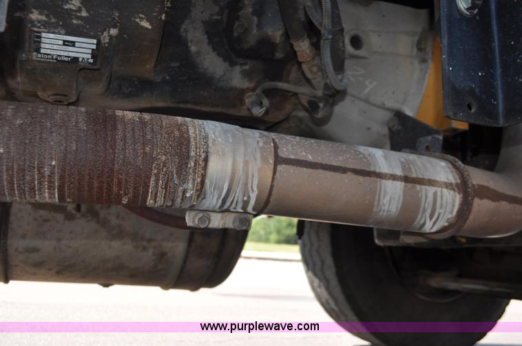 image for item F2498 2003 Sterling LT9500 flatbed truck