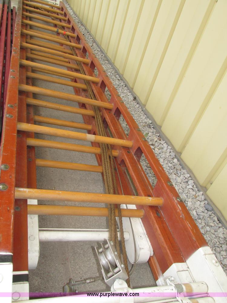 image for item H4518 35' three section wood extension ladder