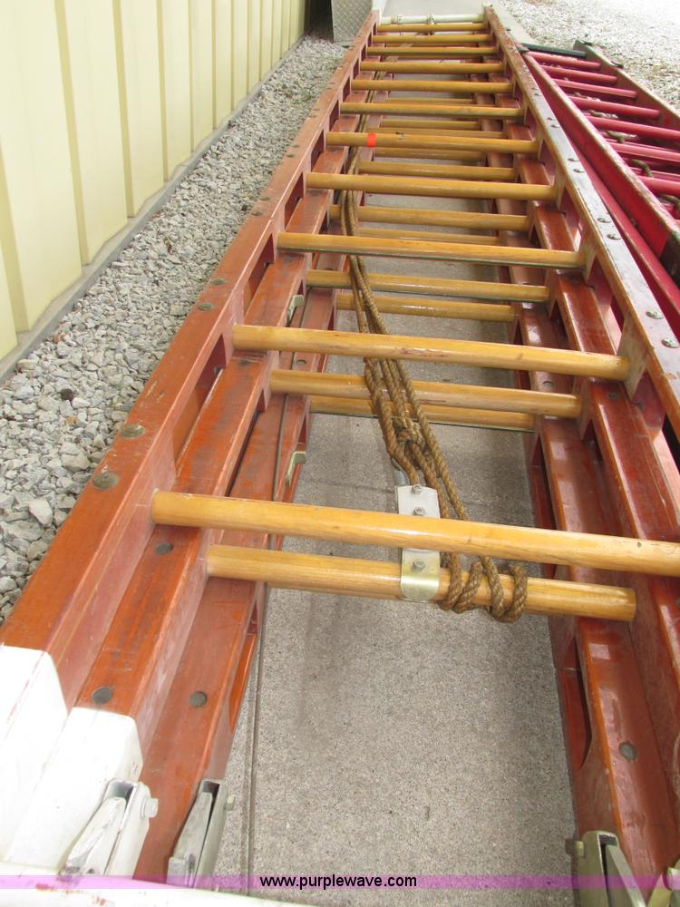 image for item H4518 35' three section wood extension ladder