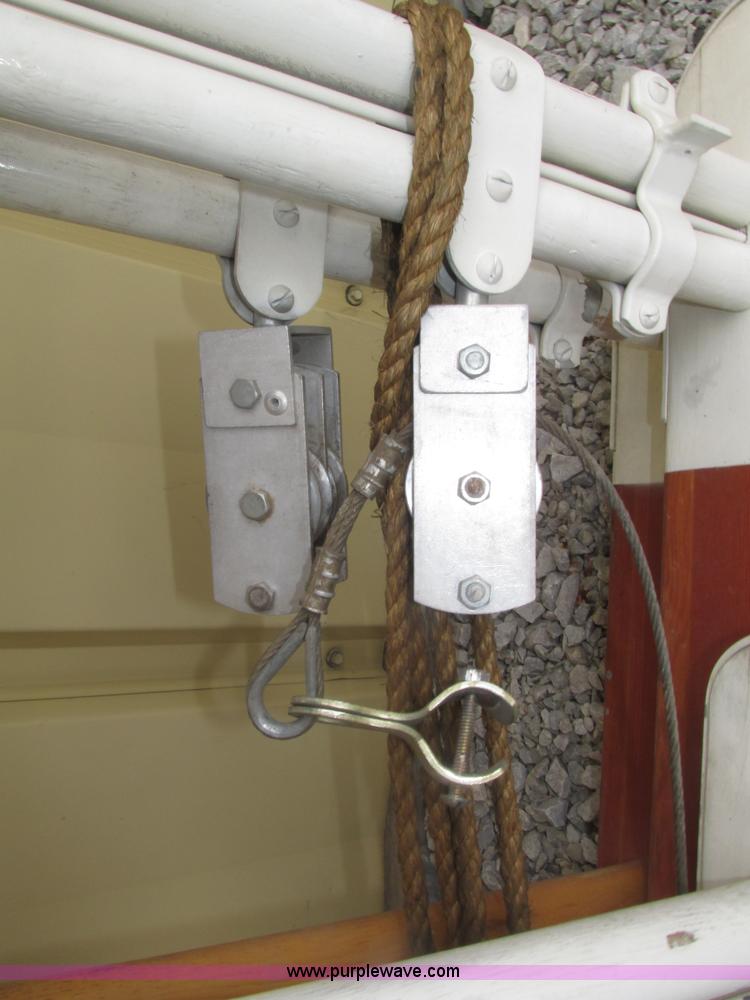 image for item H4518 35' three section wood extension ladder