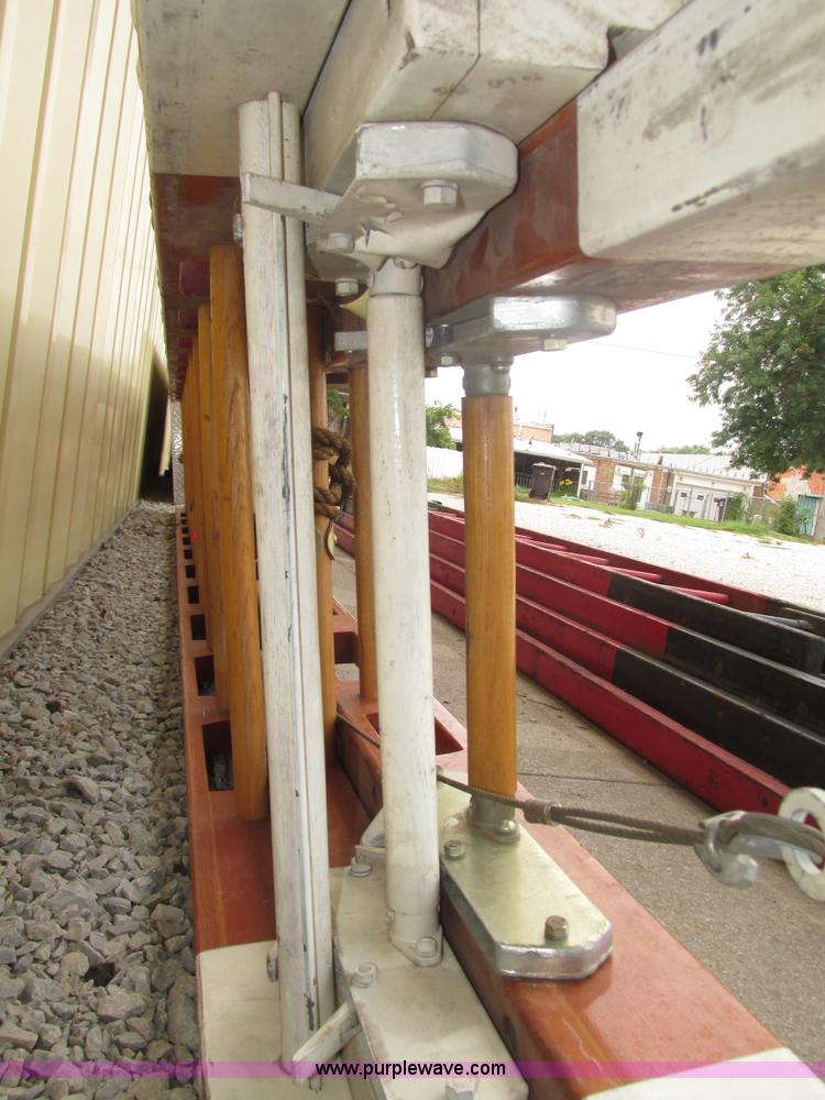 image for item H4518 35' three section wood extension ladder