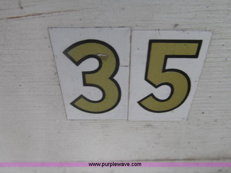 image for item H4518 35' three section wood extension ladder