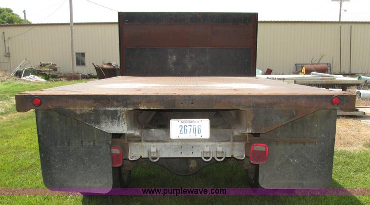 image for item H4520 1989 Chevrolet C60 Custom Deluxe dump flatbed truck