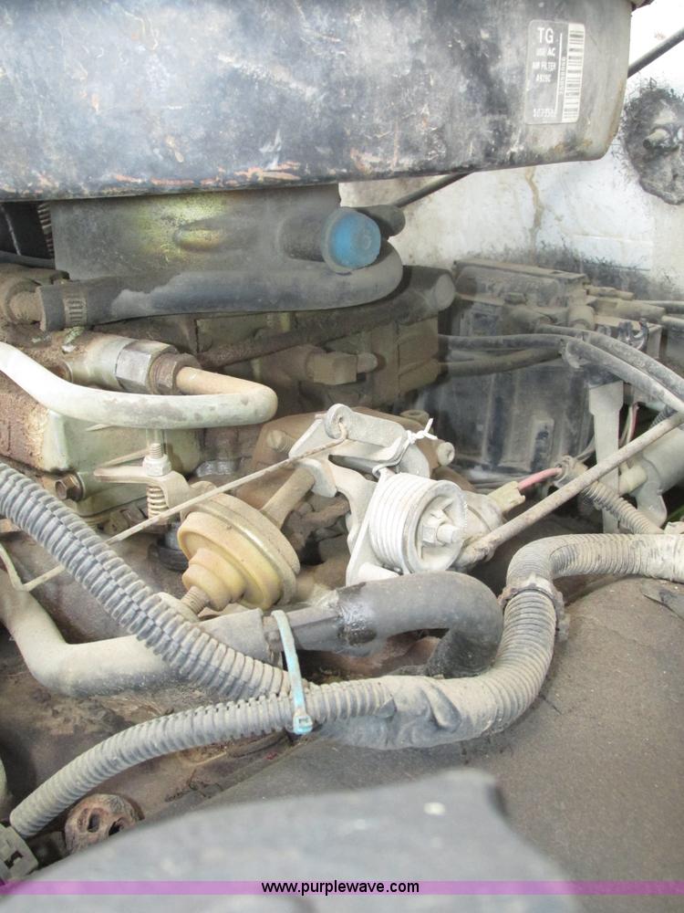 image for item H4520 1989 Chevrolet C60 Custom Deluxe dump flatbed truck