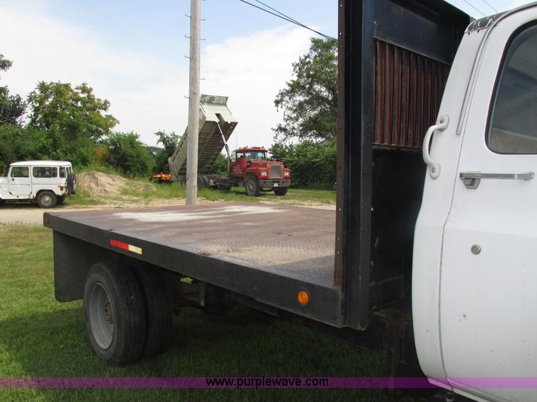 image for item H4520 1989 Chevrolet C60 Custom Deluxe dump flatbed truck