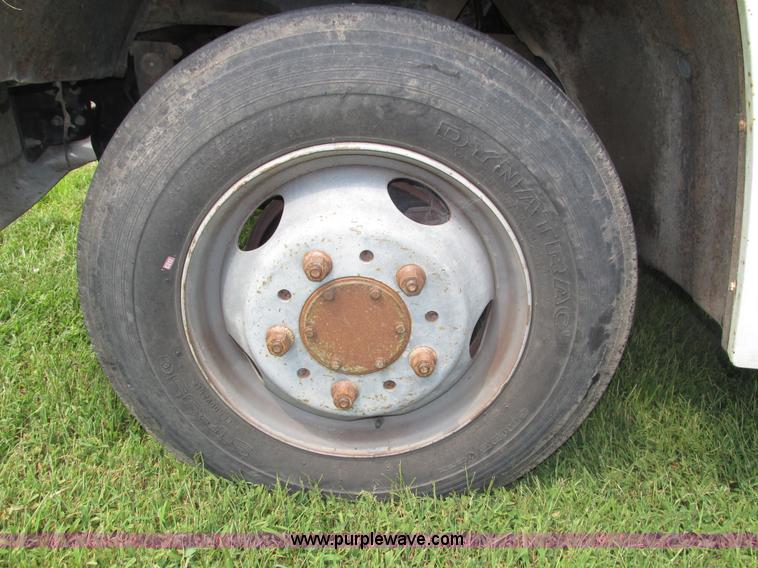 image for item H4520 1989 Chevrolet C60 Custom Deluxe dump flatbed truck