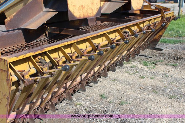 image for item J5816 1991 W.H. Manufacturing WHS chip spreader