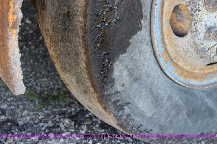 image for item J5816 1991 W.H. Manufacturing WHS chip spreader