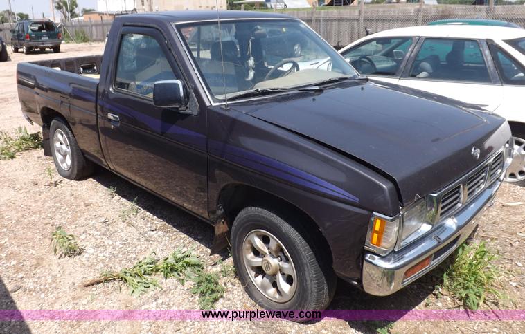 image for item J6930 1997 Nissan XE pickup truck