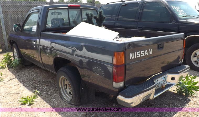 image for item J6930 1997 Nissan XE pickup truck