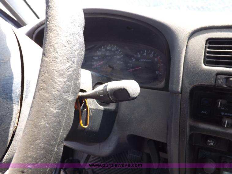 image for item J6930 1997 Nissan XE pickup truck