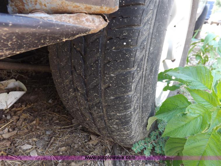 image for item J6930 1997 Nissan XE pickup truck