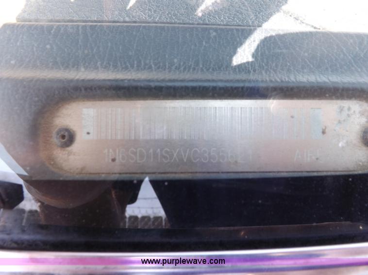 image for item J6930 1997 Nissan XE pickup truck