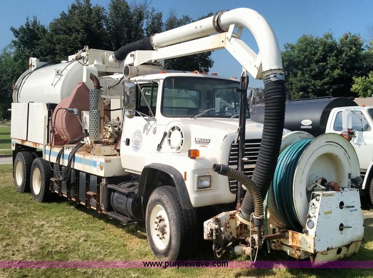 image for item K1020 1994 Ford L8000 vacuum truck