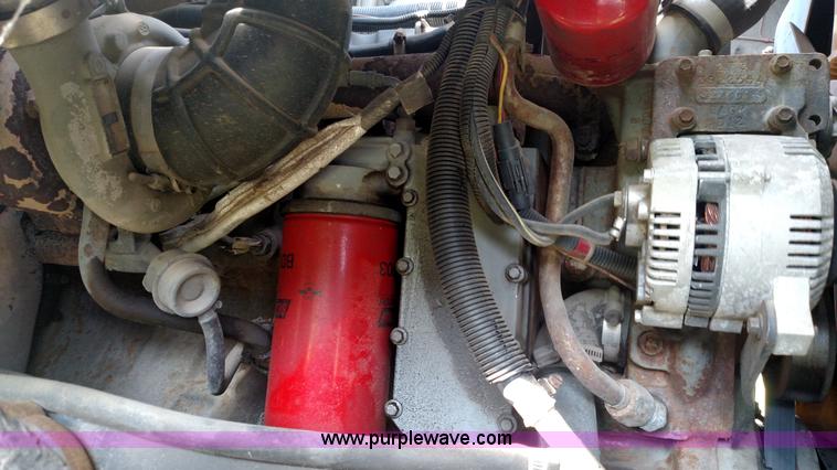 image for item K1020 1994 Ford L8000 vacuum truck