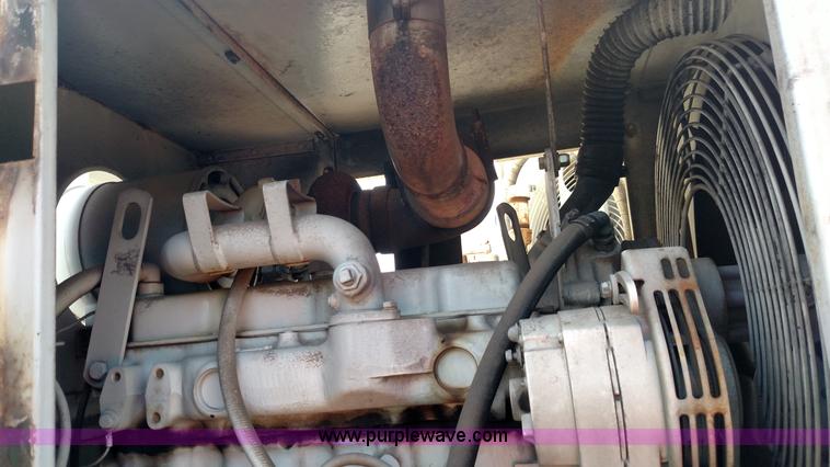 image for item K1020 1994 Ford L8000 vacuum truck