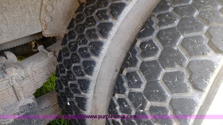 image for item K1020 1994 Ford L8000 vacuum truck