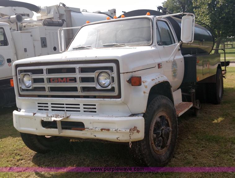 image for item K1021 1985 GMC 7000 oil distributor truck