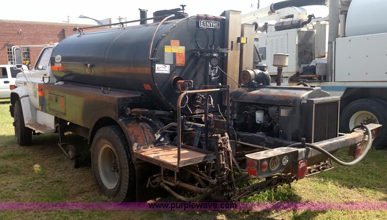 image for item K1021 1985 GMC 7000 oil distributor truck
