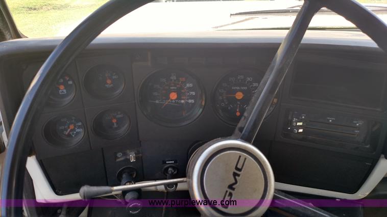 image for item K1021 1985 GMC 7000 oil distributor truck