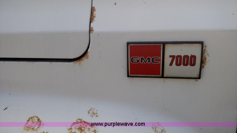 image for item K1021 1985 GMC 7000 oil distributor truck