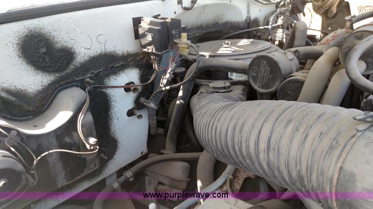 image for item K1021 1985 GMC 7000 oil distributor truck