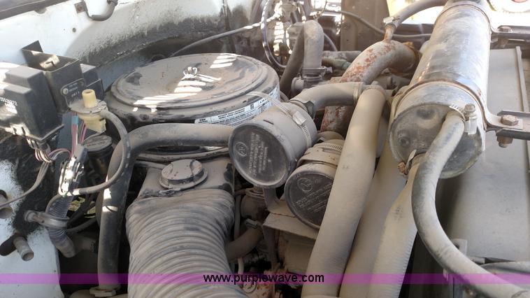 image for item K1021 1985 GMC 7000 oil distributor truck