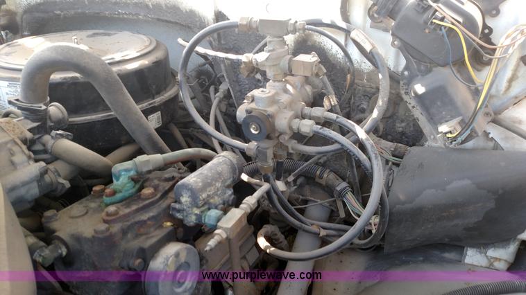 image for item K1021 1985 GMC 7000 oil distributor truck