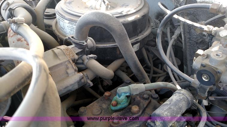 image for item K1021 1985 GMC 7000 oil distributor truck