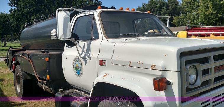 image for item K1021 1985 GMC 7000 oil distributor truck