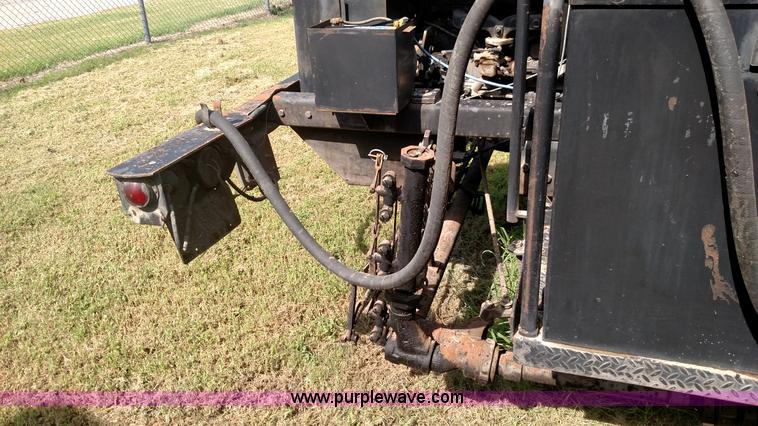 image for item K1021 1985 GMC 7000 oil distributor truck