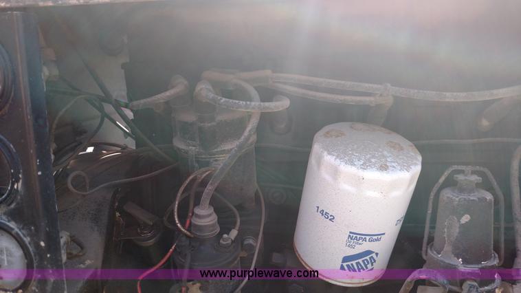 image for item K1021 1985 GMC 7000 oil distributor truck