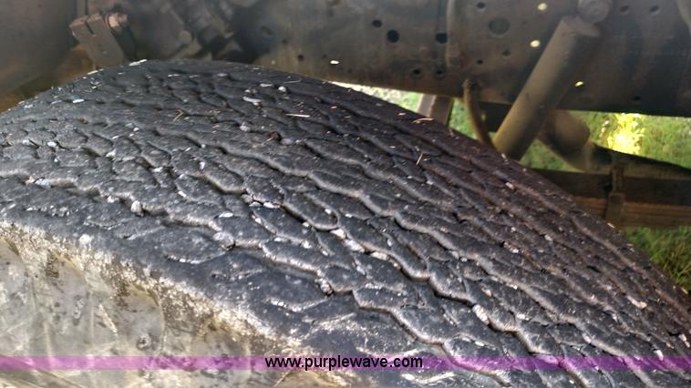 image for item K1021 1985 GMC 7000 oil distributor truck