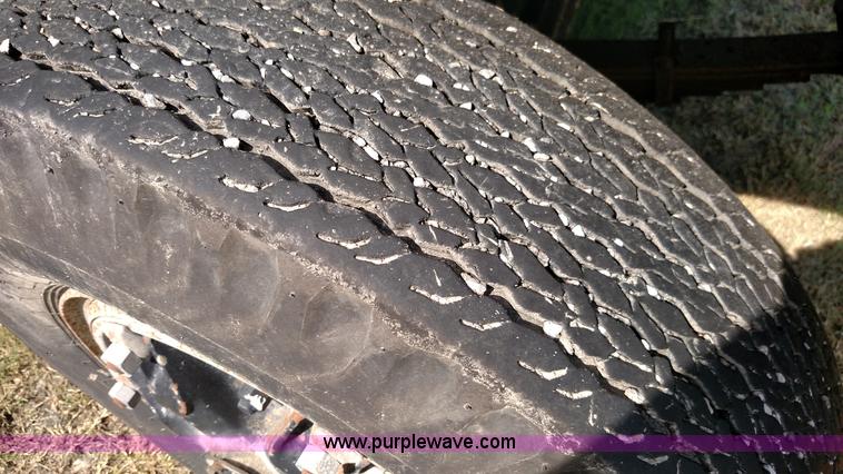 image for item K1021 1985 GMC 7000 oil distributor truck