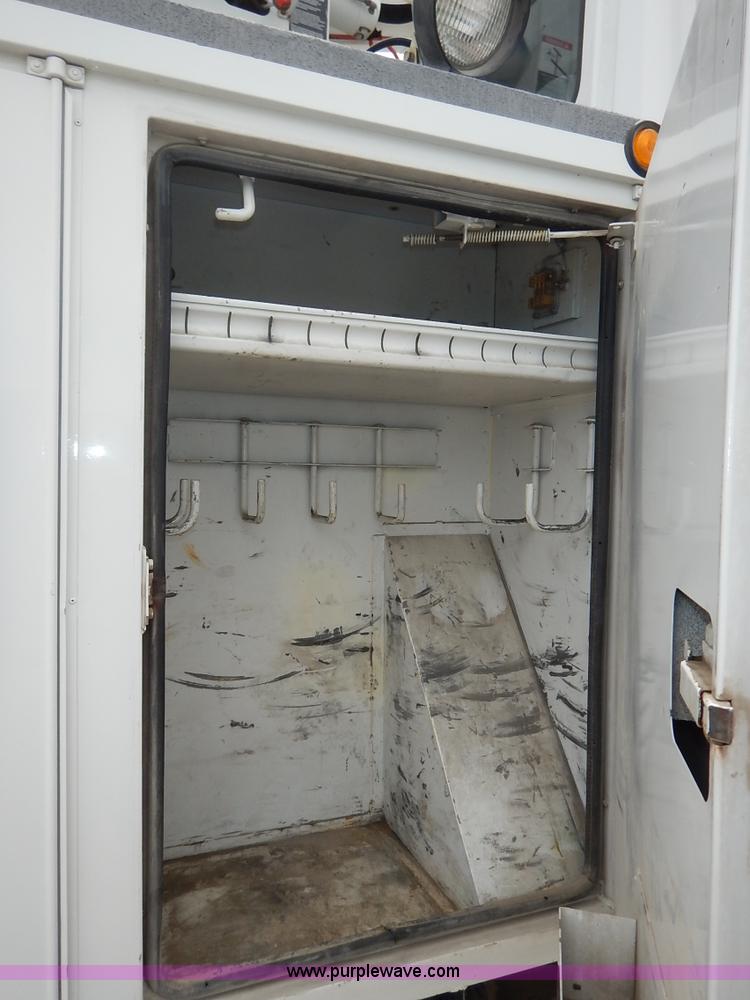 image for item K1528 2002 Freightliner FL70 bucket truck