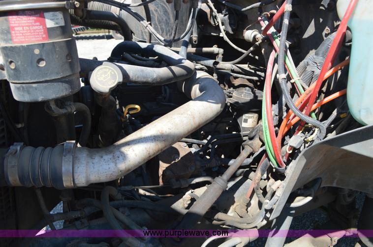 image for item BM9331 1999 Ford F800 flat bed truck with mud mixer