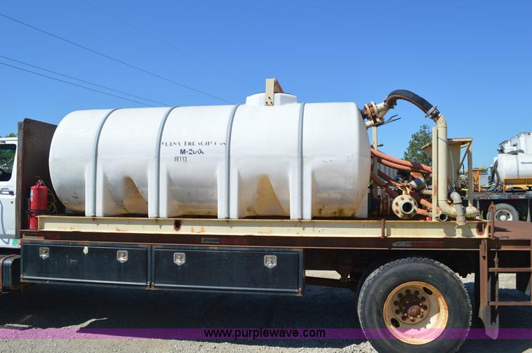 image for item BM9331 1999 Ford F800 flat bed truck with mud mixer