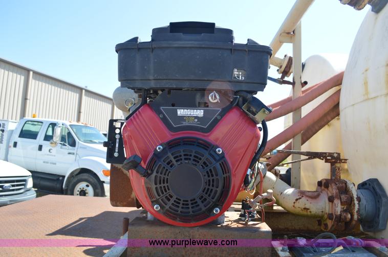 image for item BM9331 1999 Ford F800 flat bed truck with mud mixer